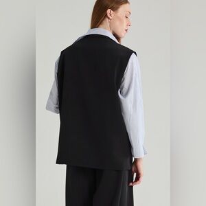 Black and White Striped women’s Shirt
New with tags